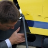 Instructor inspecting R22 oil cooler