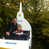 Father and son enjoying Legoland helicopter